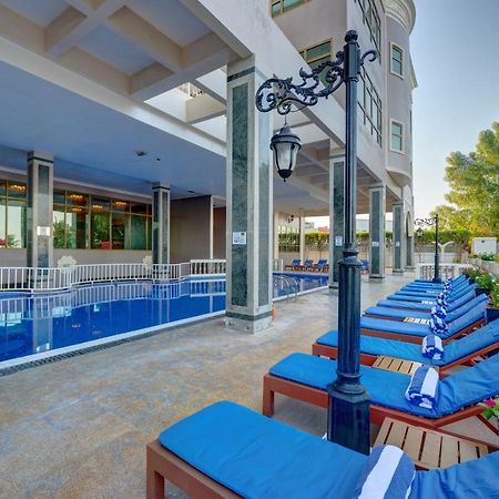 Sahara Beach Resort & Spa Sharjah Exterior photo The pool at the hotel