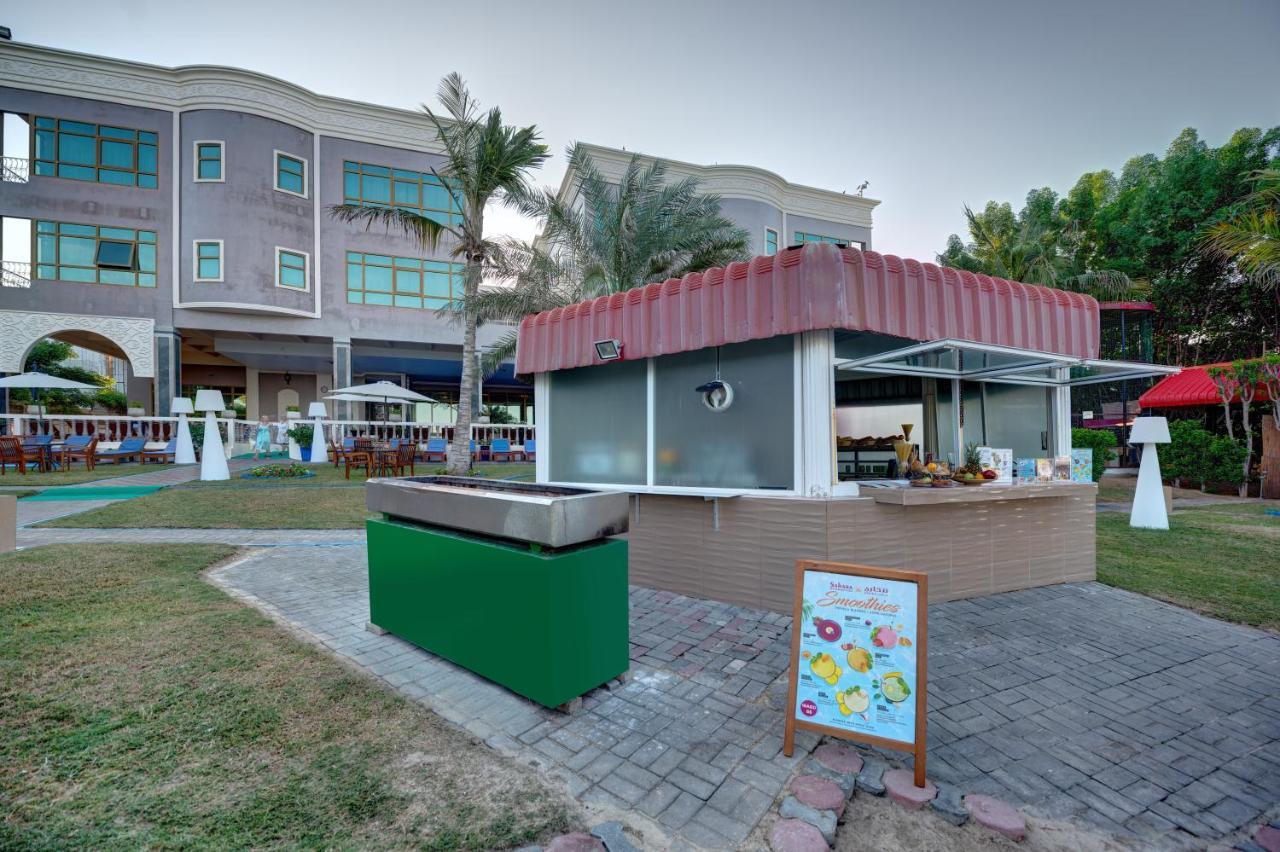 Sahara Beach Resort & Spa Sharjah Exterior photo The swimming pool at the hotel
